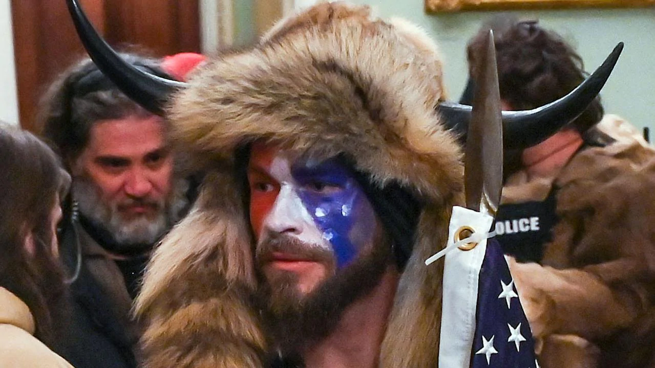 Capitol riots QAnon ‘shaman’ Jacob Chansley unrecognisable in mugshot