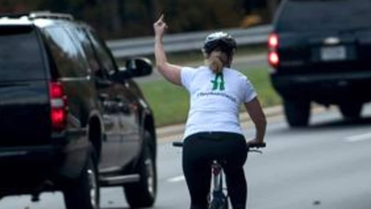 Juli Briskman sworn in after losing job for flipping off Trump