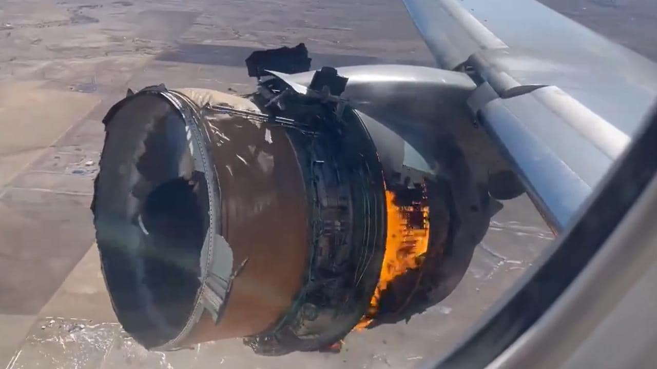 Passenger films engine catching on fire