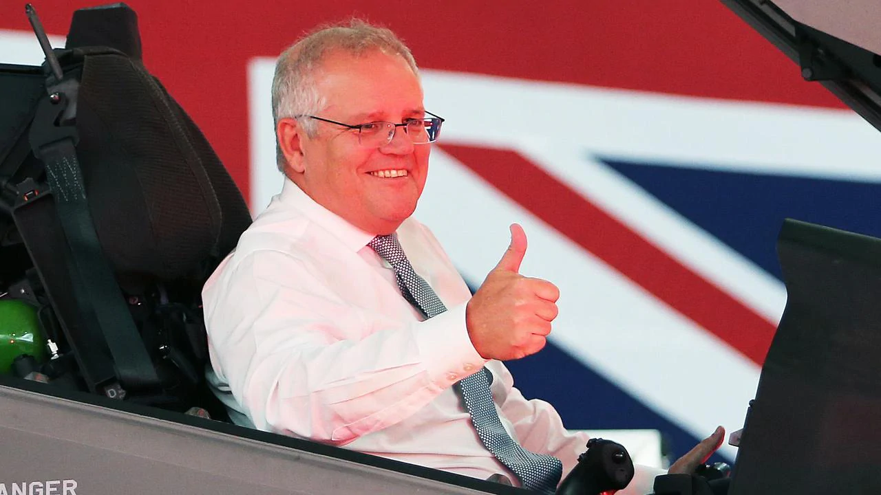 Scott Morrison walks to press conference to Top Gun soundtrack
