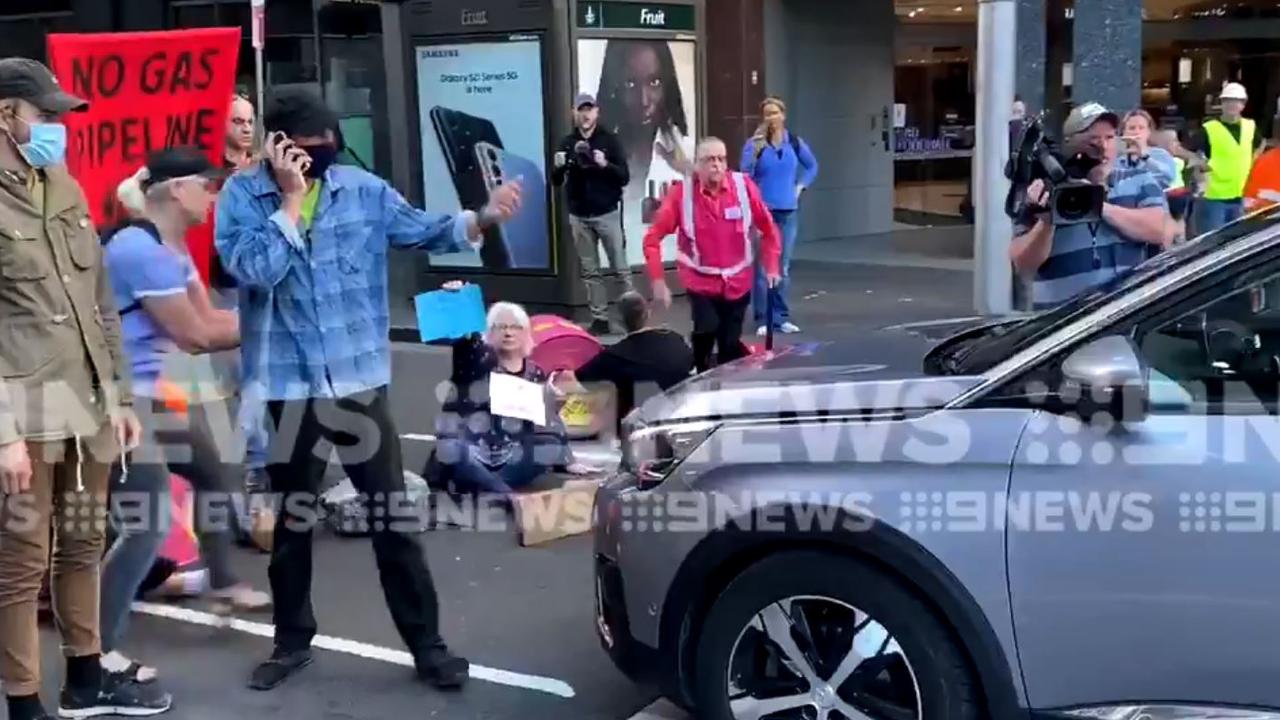 Extinction Rebellion protesters in Sydney deal with furious driver