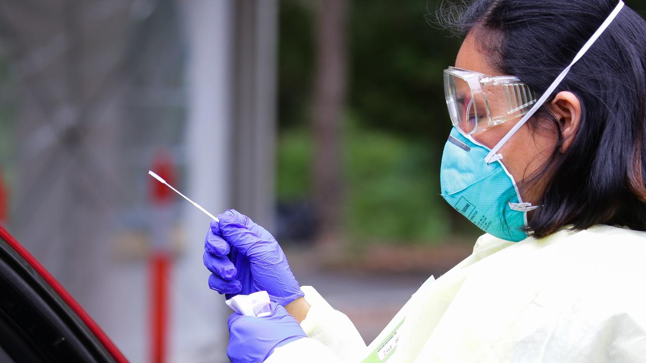 Four local cases, Brisbane in lockdown