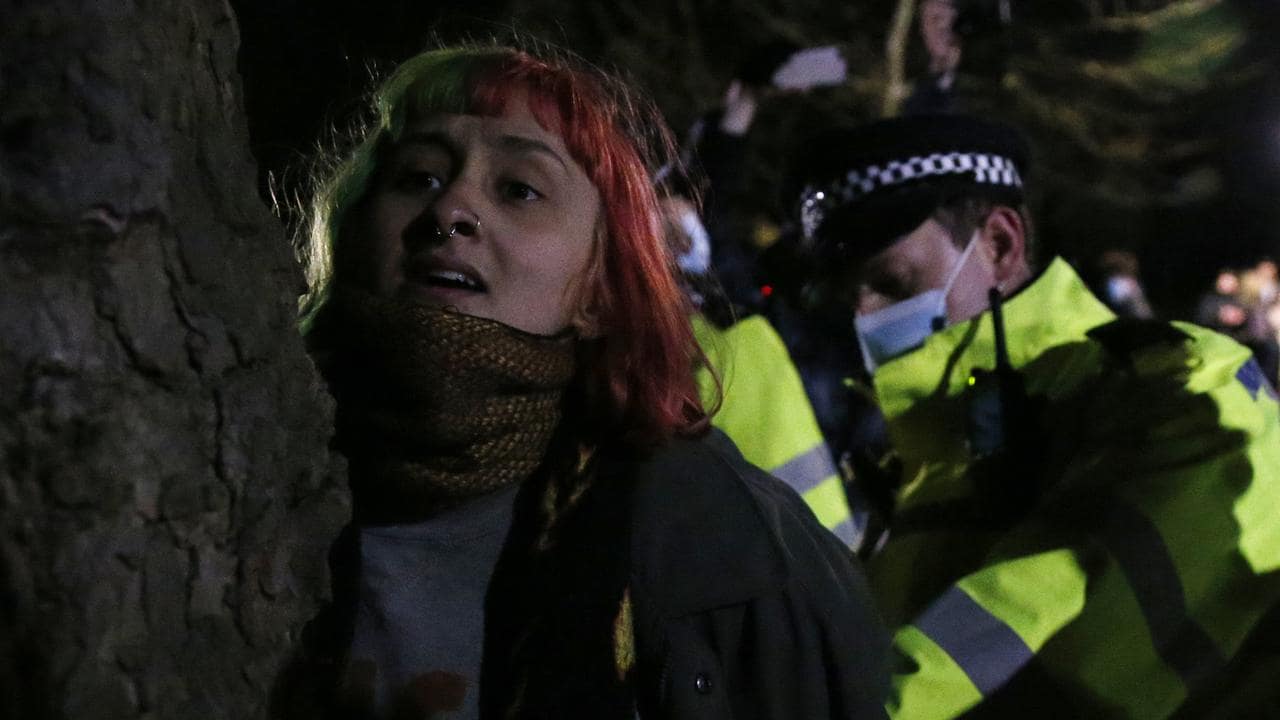 Four mourners arrested by police