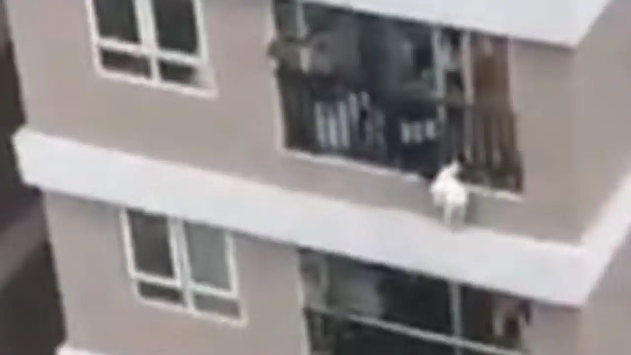 Heart-stopping video shows moment little girl falls from high rise apartment balcony