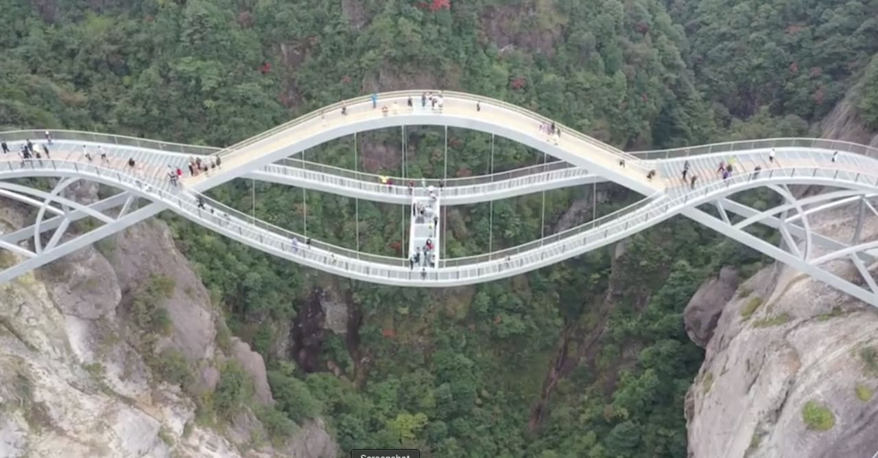 Incredible 100m ‘bending’ glass bridge opens in China