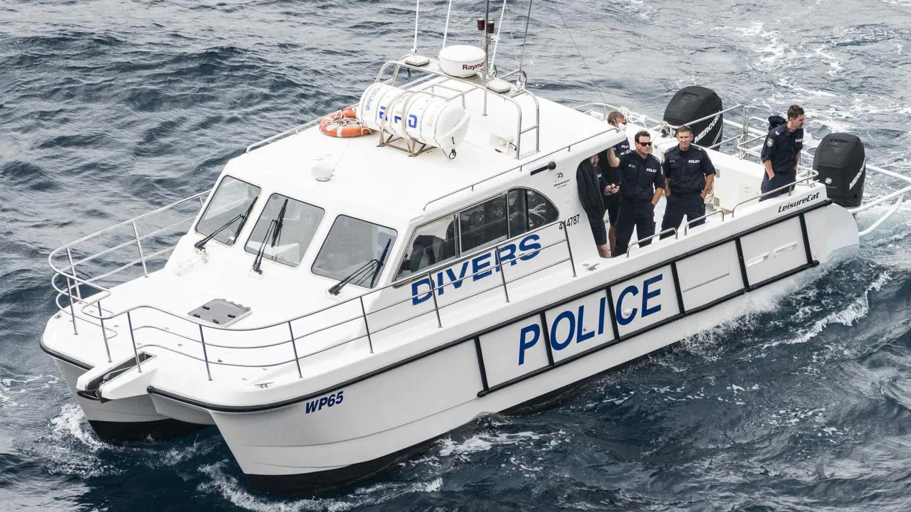 Police divers search cliffs near Dover Heights