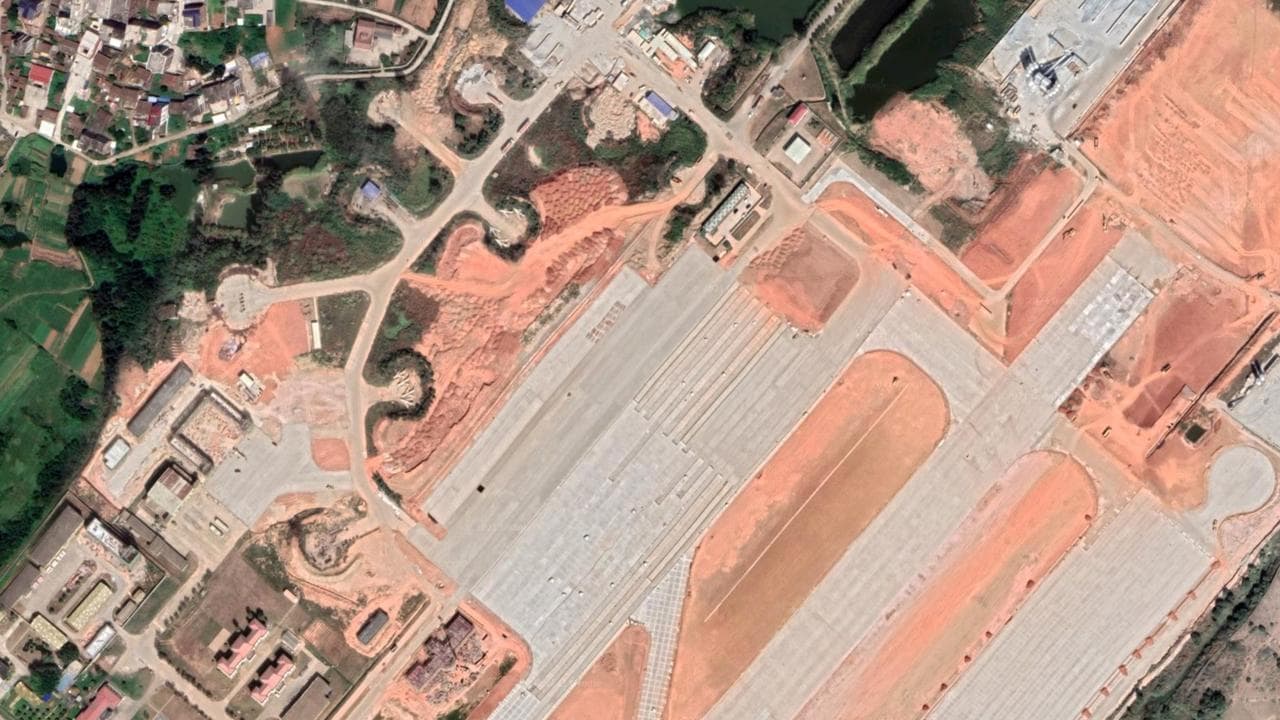 Satellite photos reveal extent of China’s military airfield expansion