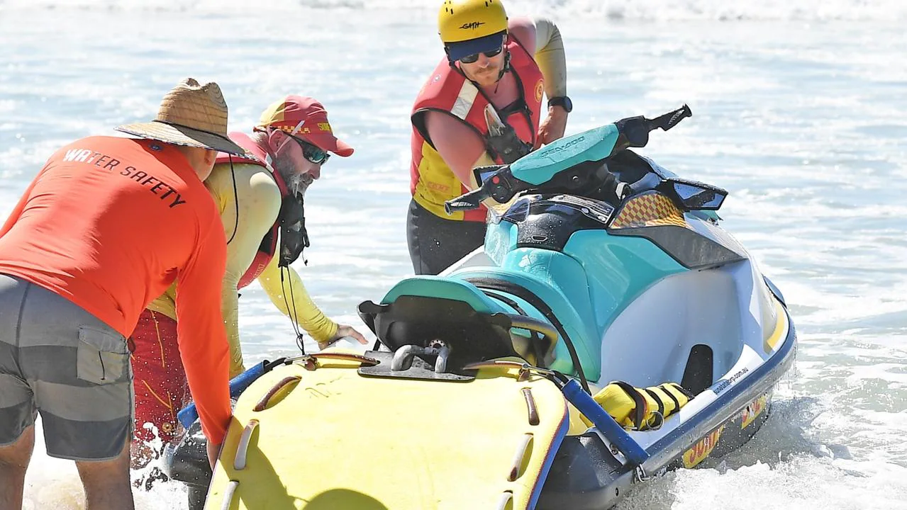 Vow to find missing swimmer