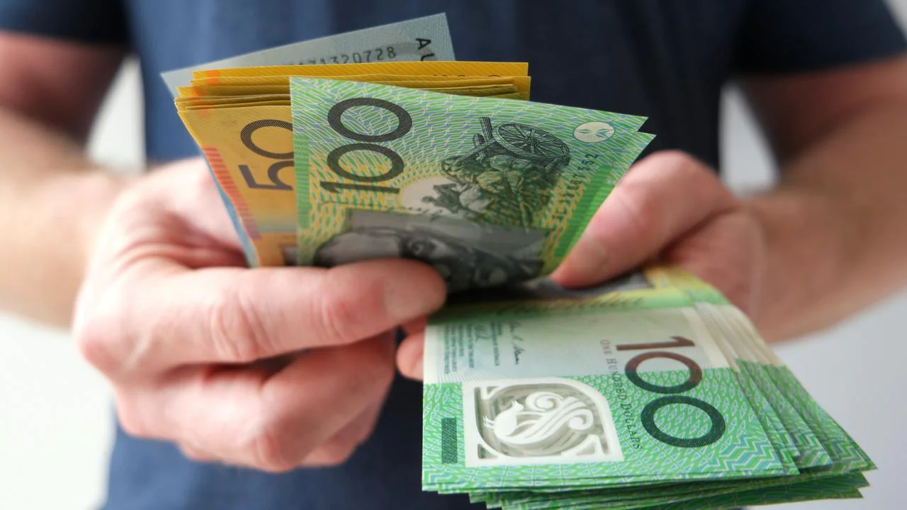 Aussies are hoarding huge amounts of cash despite drop in ATM withdrawals