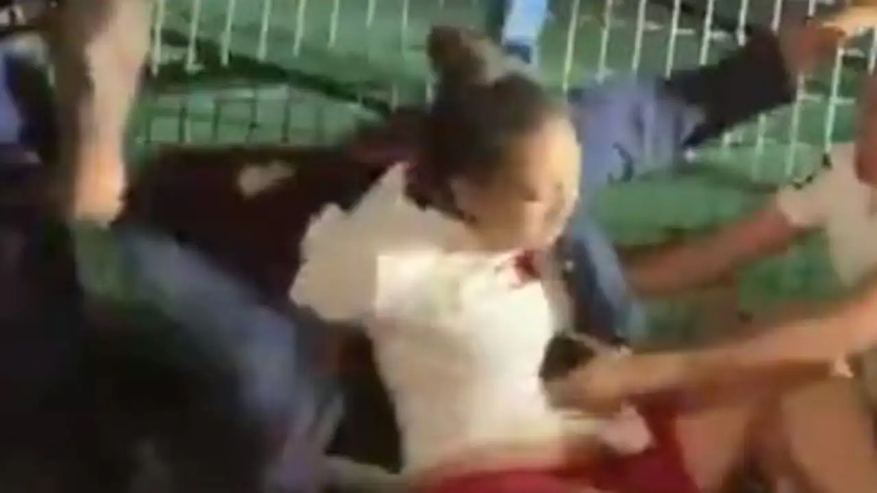 Video shows police throw woman to ground